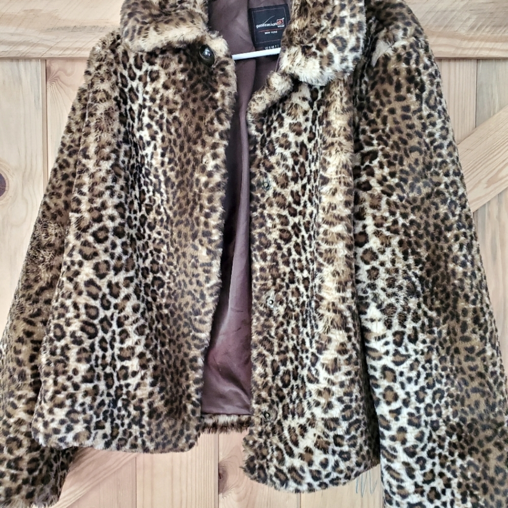 Generation NXT wear faux fur coat